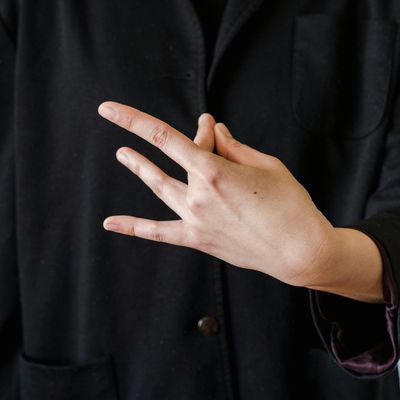 Detailed close-up of a person hands in a mudra position